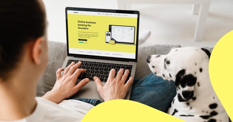 Man sitting on his laptop looking at the Holvi Founder Account page